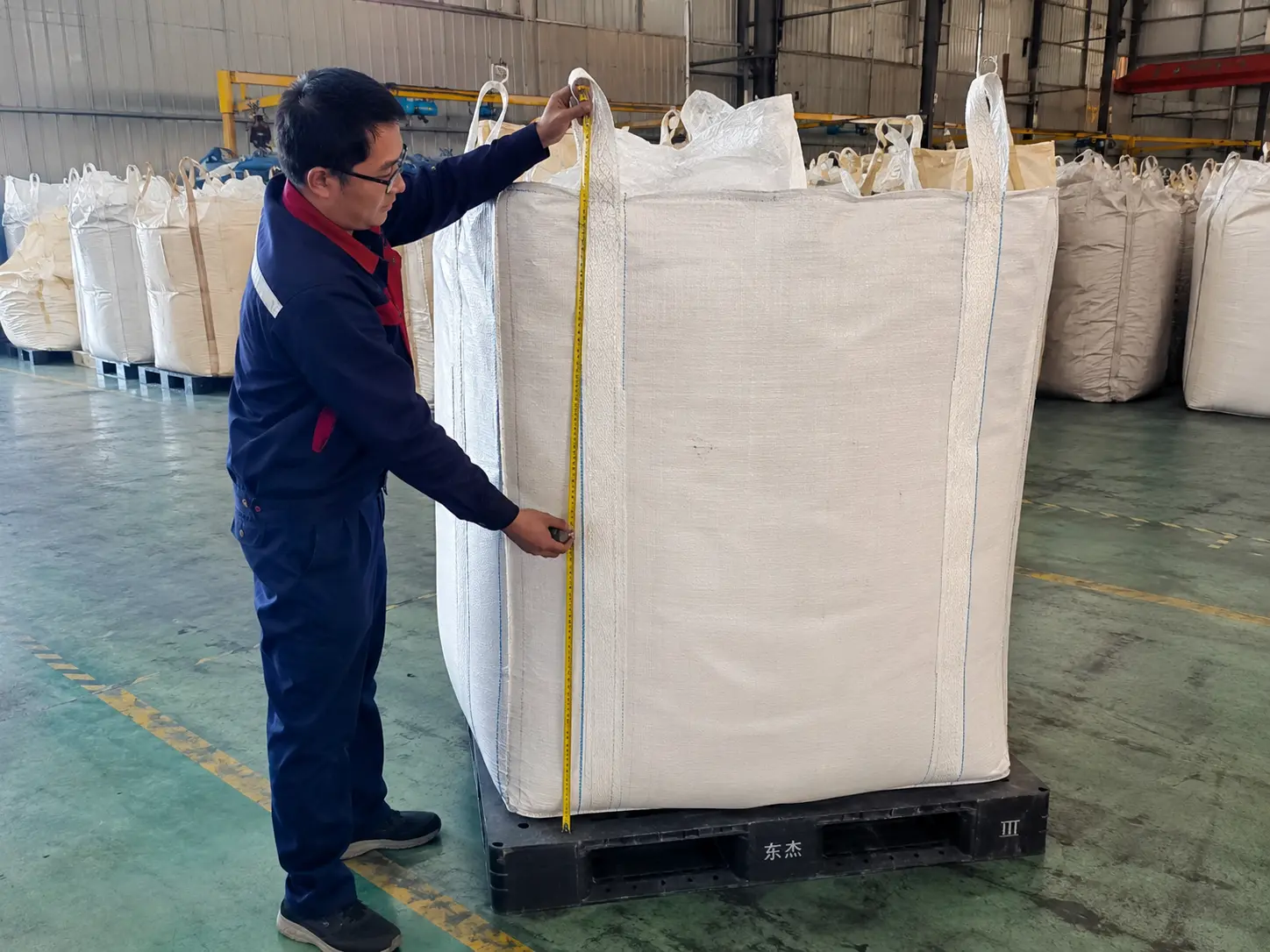 FIBC bulk bag lifting loops in four-loop, two-loop and single-loop configurations